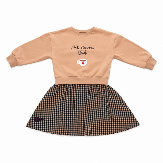 Girls sweatshirt-style dress with tan top and dark checkered skirt, graphic chest print