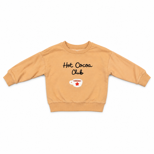 Cocoa Club sweatshirt in tan with “Hot Cocoa Club” hot cocoa logo graphic print