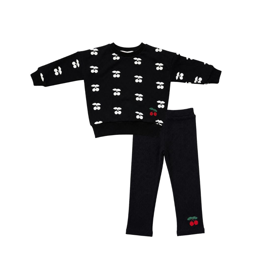 Black toddler sweatshirt and pants set with white bows and small red cherry accents
