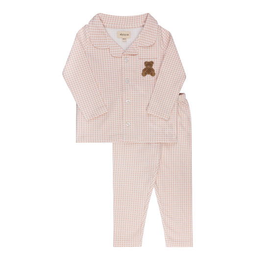 Pink gingham teddy pajama set with button-up shirt, long sleeves, and matching pants