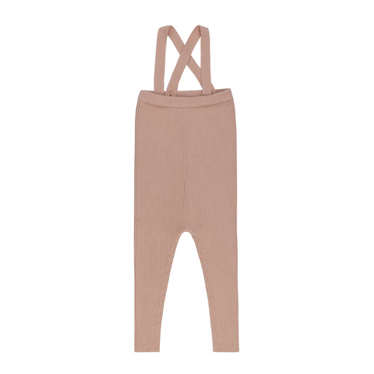 Pink knit overalls with crossed back straps and long pant legs
