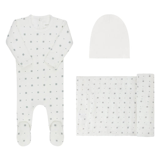 White geometric print take-me-home set with hat and matching folded blanket