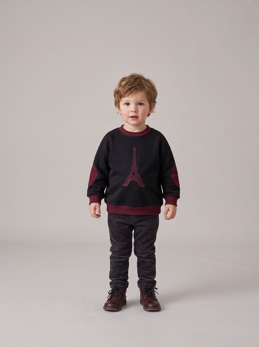 Boys dark sweatshirt with burgundy trim and Eiffel Tower front graphic