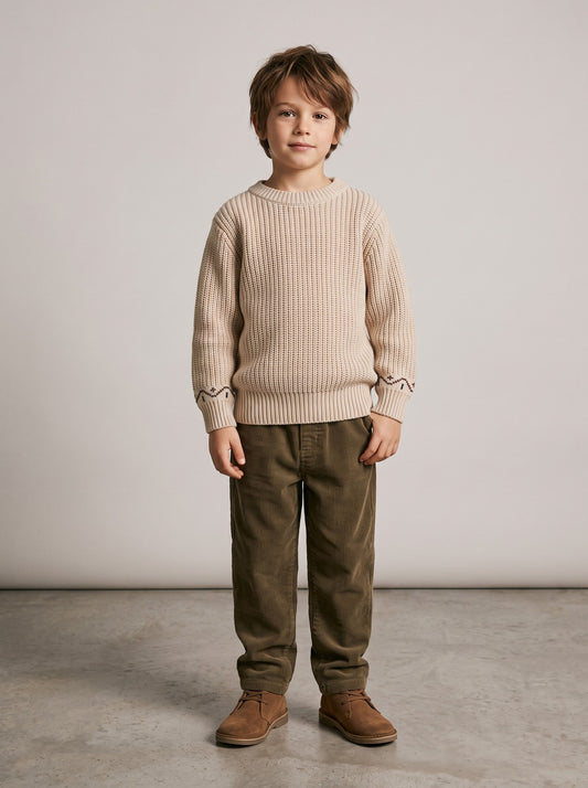 Beige chunky knit round-neck sweater with ribbed cuffs and hem