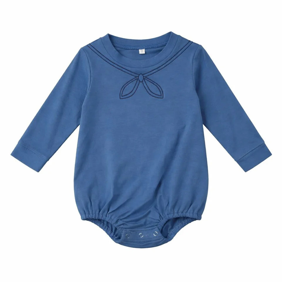 Blue sailor-style long-sleeve romper with bow applique and snap bottom