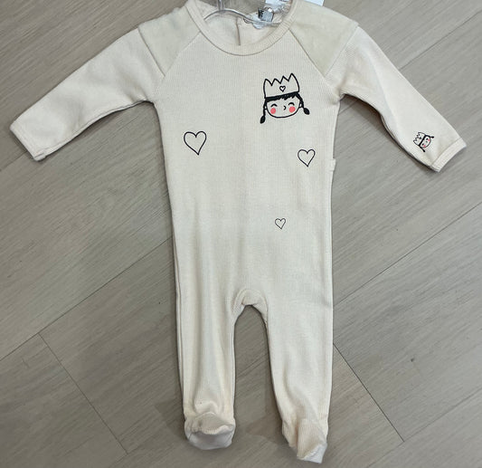 Baby romper with girl faces print