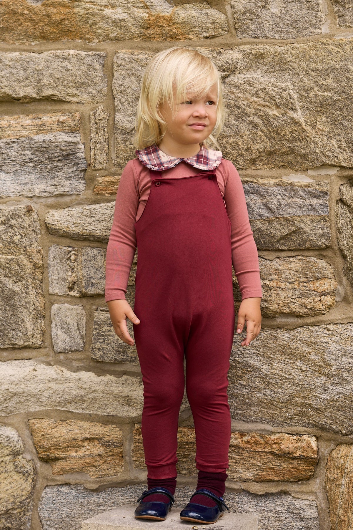 Burgundy overalls set with plaid collar and long sleeves on child